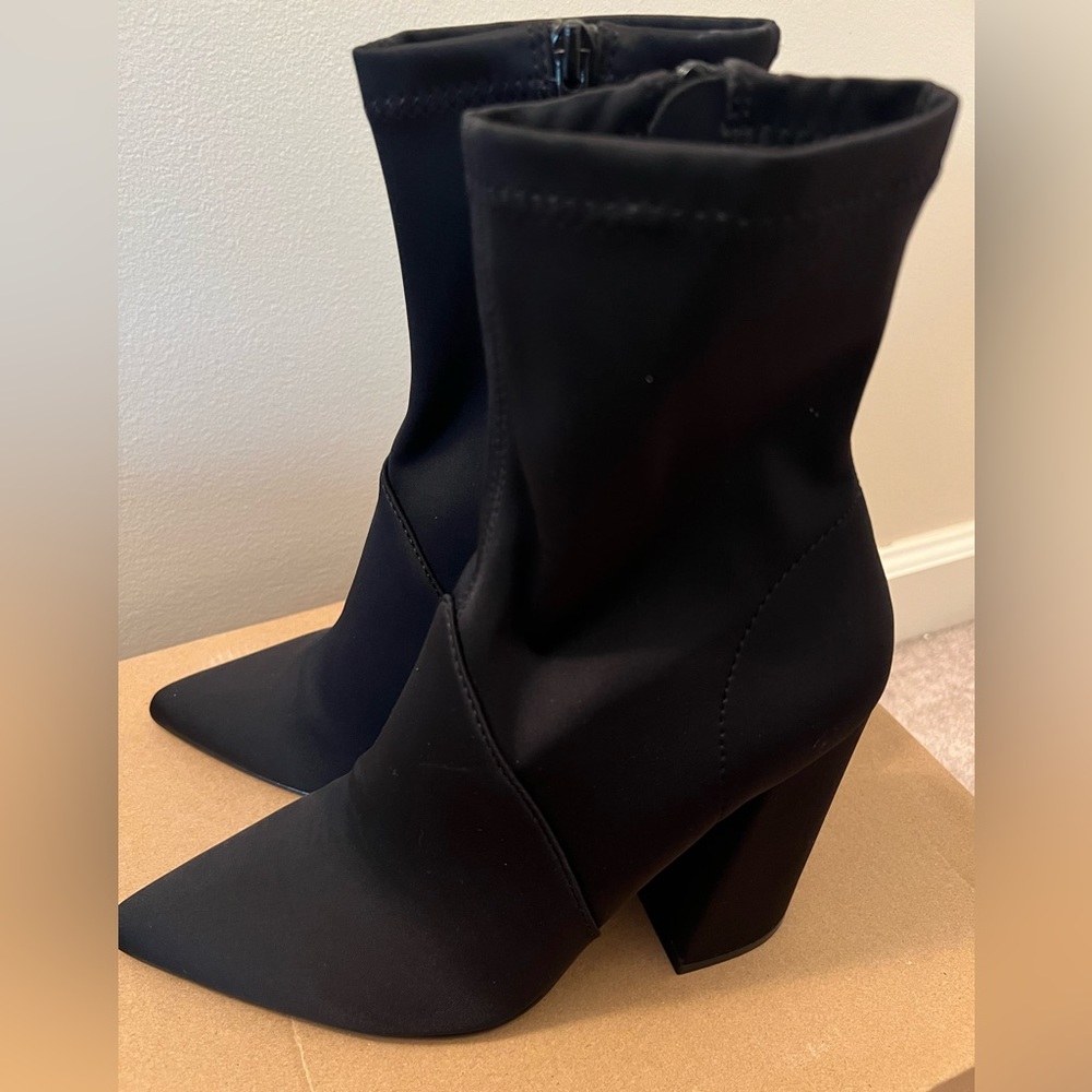 Black heeled Steve Madden boots in size 9